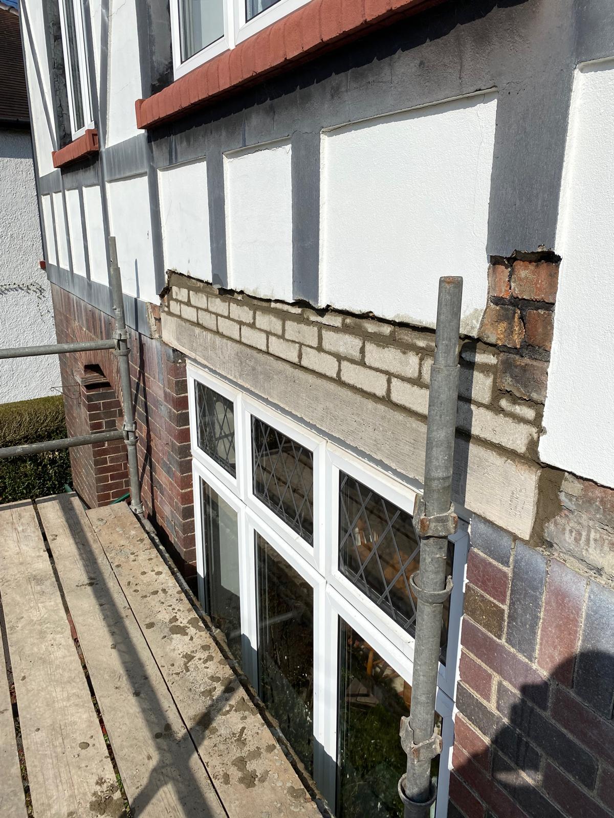 Exterior timber framing before repair